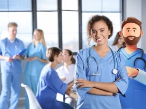 A picture showing multiple healthcare workers next to a System C healthcare worker.