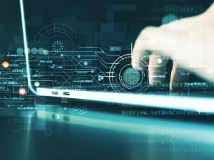 A picture displaying a laptop and digital technology.