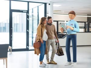 A picture of a pregnant woman and a man stood with a healthcare System C character on an electronic device.