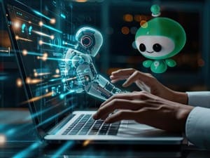 A picture of the System C AI robot next to a man on a laptop.