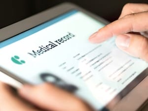 A picture of a System C electronic patient record on an iPad device.