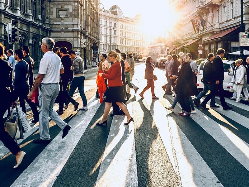 People walking over a crossing